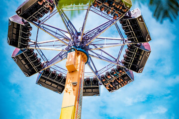 Visitors to the amusement park circling on the carousel at vinpearl land, Nha Trang city, Viet Nam