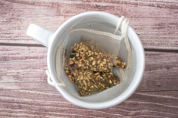 Herbal Tea bags in tea cup to prepare a cup of tea