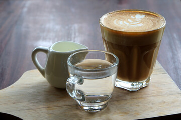 cup of hot latte art coffee