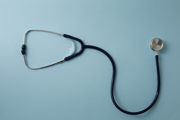 Medical stethoscope on a blue background