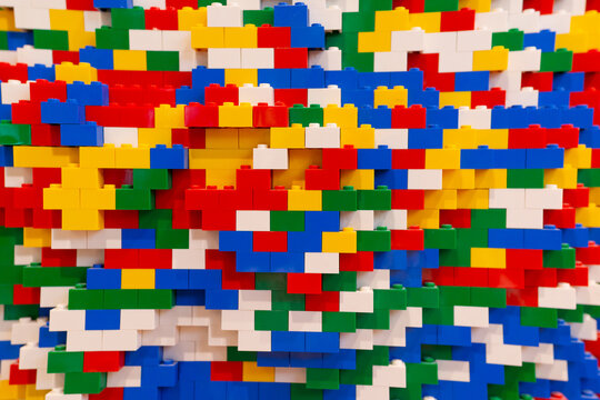 Stack of colorful lego brick background. Lego is a line of plastic construction toys that are manufactured by The Lego Group company in Denmark. DOHA, QATAR - 31 OCT 2019