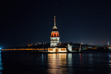 Maiden's Tower at night.Most famous tower in istanbul with city light background 