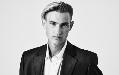 Handsome guy in a classic suit hairstyle black and white photography