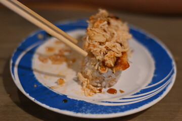Plate sushi at a sushi bar