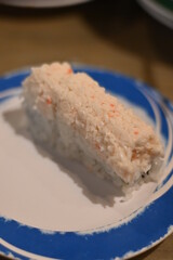 Plate sushi at a sushi bar