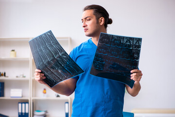 Young male doctor radiologist working in the clinic