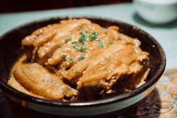 A delicious Chinese dish of braised pork in brown sauce