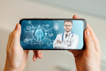 Portrait of a man, a doctor on a smartphone screen, a video conference, an appointment with a doctor online. Hologram graphics medical indicators. Medical technology concept, the future of medicine.