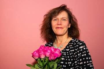 Portrait of a woman with flowers for Valentine's Day.