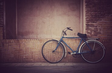 Naklejka na ściany i meble old bicycle in the street