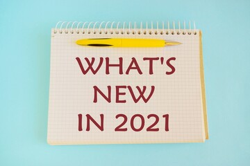 What's new in 2021 text, inscription, phrase written in a notebook Business concept.