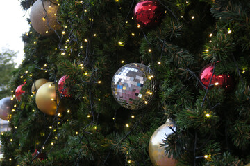 Obraz na płótnie Canvas Christmas tree decorated with glass balls For Christmas