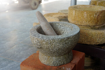 Granite mortar is utensils for cooking in the kitchen.
