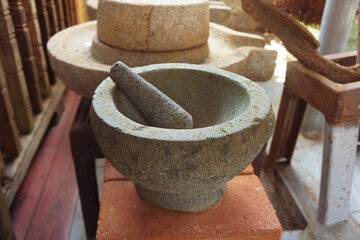 Granite mortar is utensils for cooking in the kitchen.