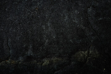 Obraz na płótnie Canvas Black stone background. Cement, concrete grunge. Background blank for design. Dark gray wall texture.