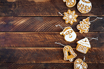 Christmas homemade gingerbread cookies on wooden background. Top view