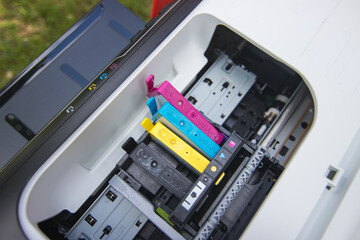 An ink cartridge or inkjet cartridge is a component of an inkjet printer that contains the ink four color