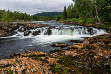 Fototapeta na wymiar Rapids on the beautiful river in Norway