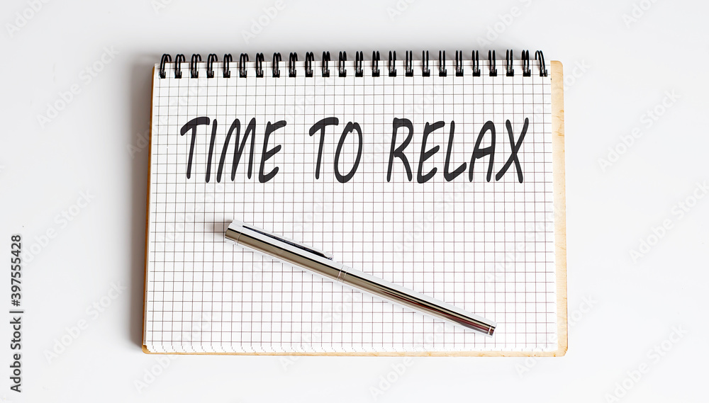 Poster notebook with pen and notes about time to relax
