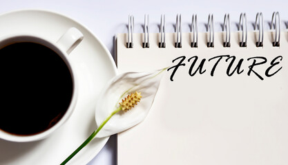 FUTURE , planning concept. notebook with text on white background with coffee