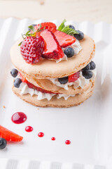 Delicious and healthy dessert with fresh berries and cream