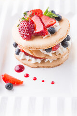 Delicious and healthy dessert with fresh berries and cream