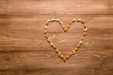 Almonds. The sign of the heart from the fruit of the walnut