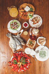 serving traditional Russian table with delicacies and treats.