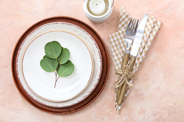 Beautiful table setting on color background