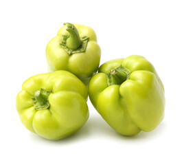 Fresh green bell peppers on white background