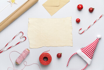 Beautiful Christmas composition with blank card on light background