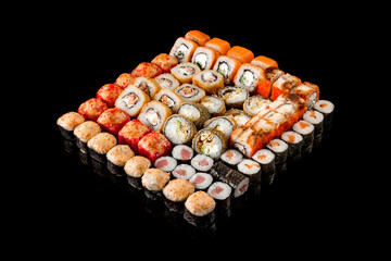 large set of rolls of fish and vegetables. Japanese food