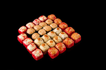 large set of rolls of fish and vegetables. Japanese food