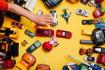 lots of baby car toys for developing games as a backdrop