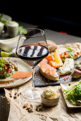 glass of wine with a variety of snacks. Georgian menu, Georgian restaurant