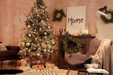 Interior of living room with fireplace decorated for Christmas