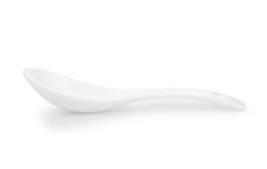 White empty ceramic spoon for soup on white background