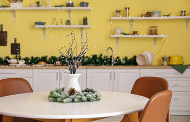 Christmas decor on table in kitchen