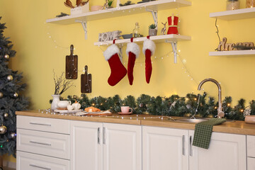 Interior of modern kitchen decorated for Christmas