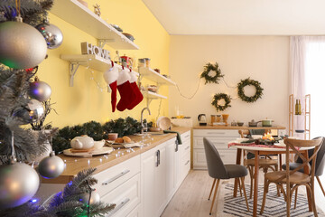 Interior of modern kitchen decorated for Christmas