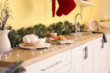 Interior of modern kitchen decorated for Christmas