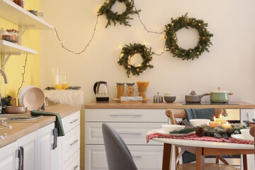 Interior of modern kitchen decorated for Christmas