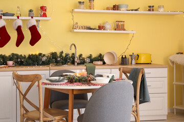 Obraz na płótnie Canvas Interior of modern kitchen decorated for Christmas