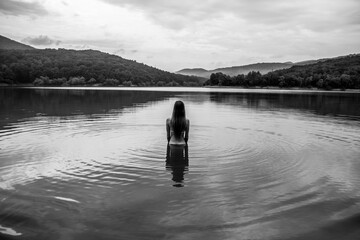 Swimming in the lake. Departure for nature. Young girls