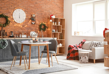 Interior of modern kitchen decorated for Christmas