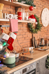 Interior of modern kitchen decorated for Christmas
