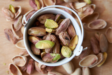 handful of whole and peeled pistachios