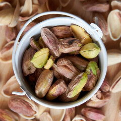 handful of whole and peeled pistachios