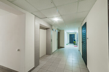 Russia, Moscow- April 17, 2020: interior public place, house entrance. doors, walls, staircase corridors