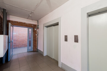 Russia, Moscow- April 17, 2020: interior public place, house entrance. doors, walls, staircase corridors